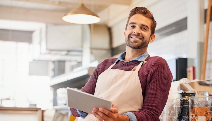 Business Owner Holding Tablet