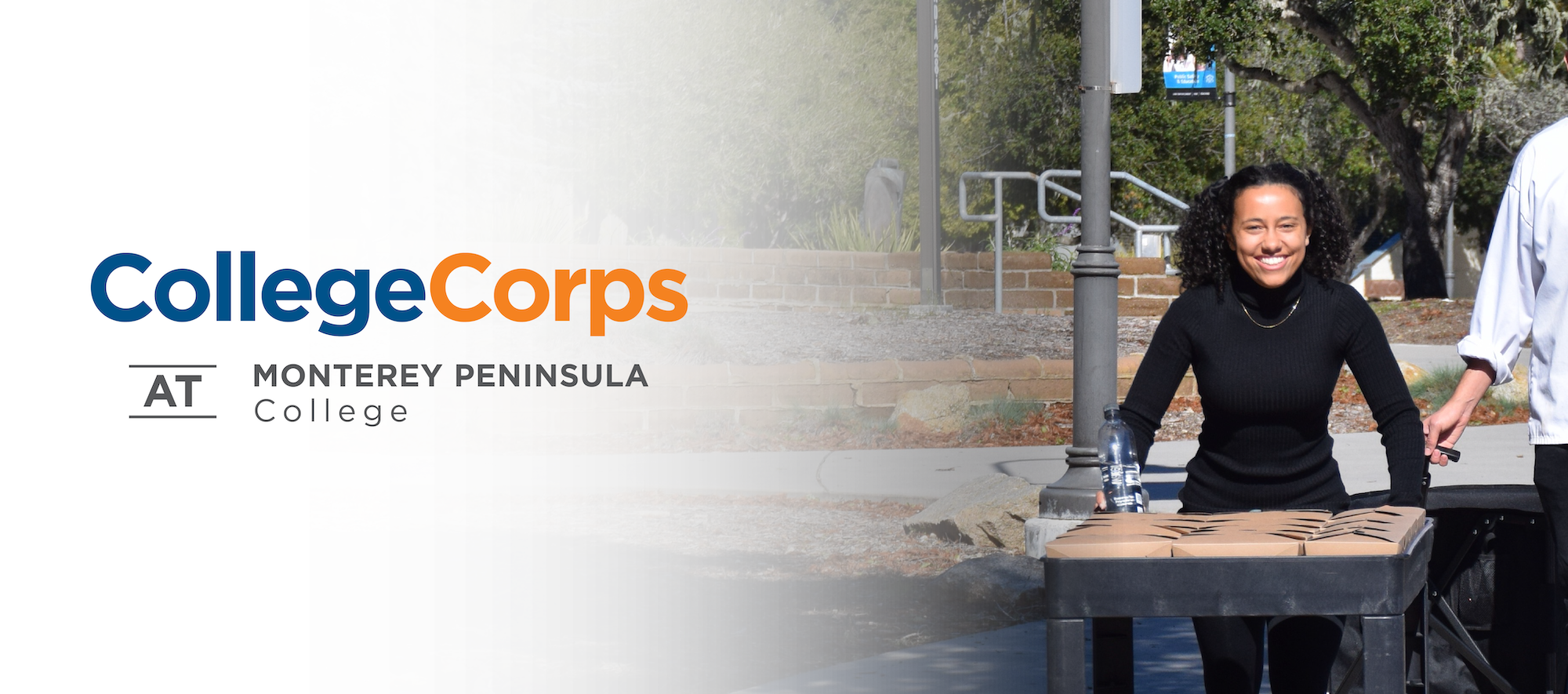 mpc student next to college corps logo