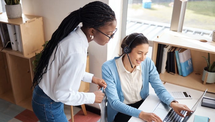 Customer representative speaking with supervisor