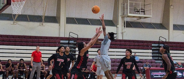 MPC Men's Basketball Player Going for a Basket
