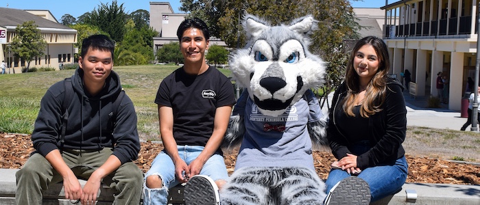 MPC Students Sitting with Louie the Lobo