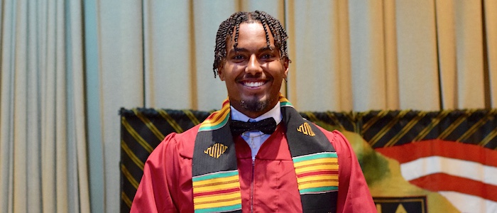 Student Graduating from Rites of Passage Ceremony