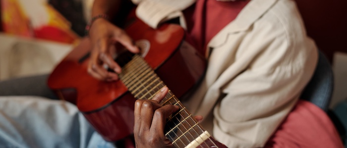man playing guitar
