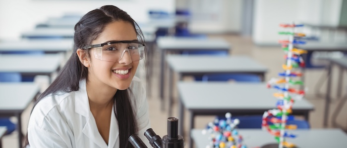 STEM Student Using Microscope