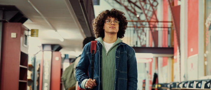College student walking through hallway