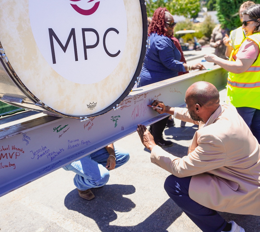 Dr. Fulbright Signing the Final Music Building Construction Beam