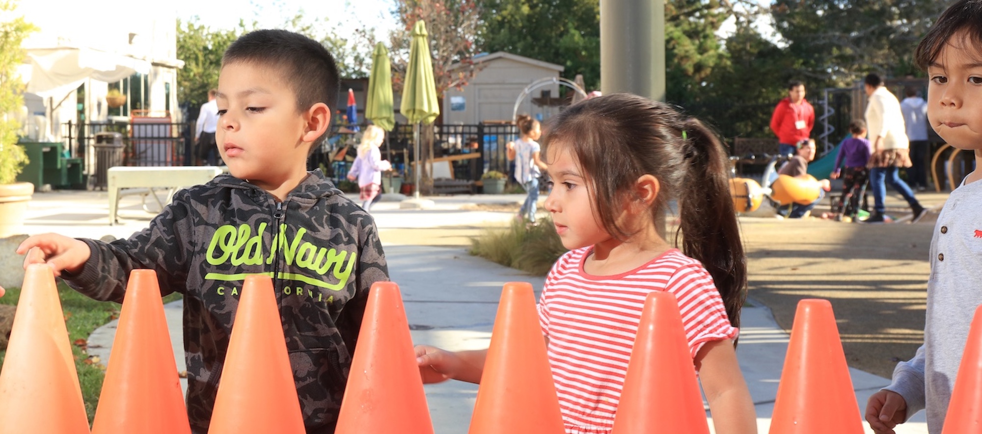 Children Playing Outside with Cones